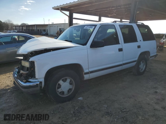 1999 GMC Yukon with VIN 1GKEC13R0XJ811710, listed as a Copart auction lot 43014995 with 311,948 mi miles and Salvage Title. Bid and sale history available at carsss.com. Image 1.