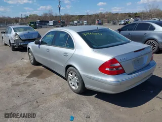 2005 Mercedes-Benz E-Class 3.2L with VIN WDBUF65J15A669561, listed as a IAAI auction lot 41888887 with 87,317 mi miles. Bid and sale history available at carsss.com. Image 3.