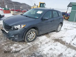 2013 Mazda CX-5 Sport z VIN JM3KE2BE9D0156274, wystawiony jako IAAI lot #41624466 z przebiegiem 159 017 mil mil oraz . Historia ofert i sprzedaży dostępna na DreamBid. Obrazek 17.