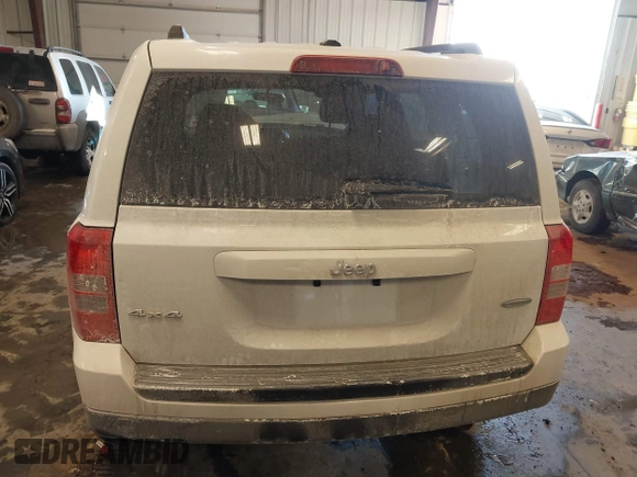 2014 Jeep Patriot Latitude with VIN 1C4NJRFB4ED864114, listed as a IAAI auction lot 41639732 with 103,119 mi miles. Bid and sale history available at carsss.com. Image 16.