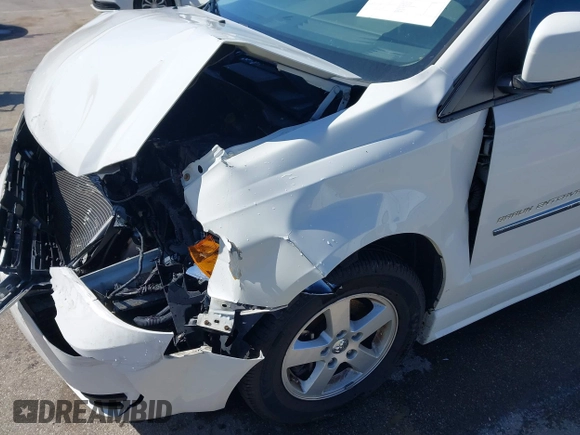 2010 Dodge Grand Caravan SXT with VIN 2D4RN5D14AR420265, listed as a IAAI auction lot 41970366 with 117,208 mi miles and . Bid and sale history available at DreamBid. Image 17.