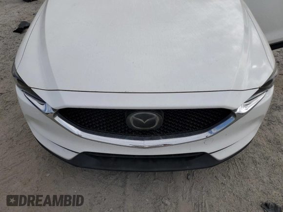2017 Mazda CX-5 Grand Touring with VIN JM3KFADL9H0220886, listed as a Copart auction lot 50344675 with 75,781 mi miles and Salvage Title. Bid and sale history available at carsss.com. Image 12.