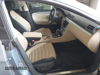 2013 Volkswagen CC Sport with VIN WVWBP7AN1DE567561, listed as a IAAI auction lot 42174906 with 157,827 mi miles. Bid and sale history available at carsss.com. Image 5.