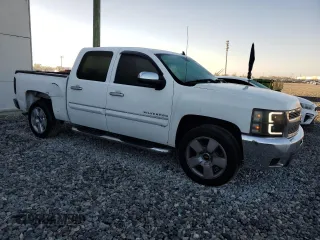 2011 Chevrolet Silverado 1500 LT with VIN 3GCPCSE00BG176118, listed as a Copart auction lot 48958465 with 110,538 mi miles and Salvage Title. Bid and sale history available at DreamBid. Image 4.