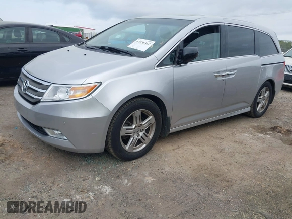 2012 Honda Odyssey Touring with VIN 5FNRL5H98CB026754, listed as a IAAI auction lot 41935562 with 165,626 mi miles. Bid and sale history available at carsss.com. Image 19.
