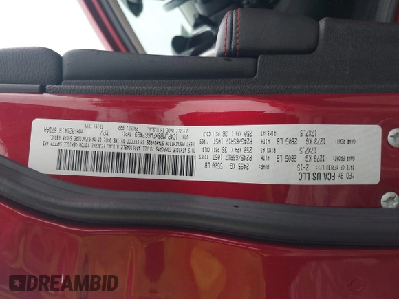 2015 Jeep Cherokee Trailhawk with VIN 1C4PJMBSXFW667469, listed as a IAAI auction lot 42438006 with 127,136 mi miles and . Bid and sale history available at DreamBid. Image 9.