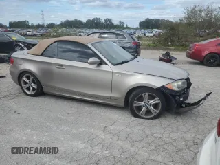 2009 BMW 1 Series 128i z VIN WBAUL73539VJ76952, wystawiony jako Copart lot #76992254 z przebiegiem Nie podano mil oraz Szkody całkowita. Historia ofert i sprzedaży dostępna na DreamBid. Obrazek 4.