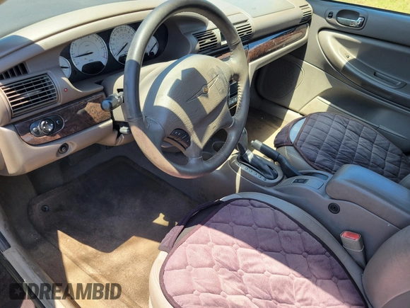 2004 Chrysler Sebring with VIN 1C3EL66RX4N227103, listed as a IAAI auction lot 42176373 with 107,692 mi miles and . Bid and sale history available at DreamBid. Image 6.