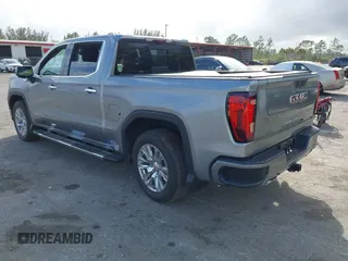 2023 GMC Sierra 1500 with VIN 3GTPHGE86PG352567, listed as a IAAI auction lot 41705291 with 14,800 mi miles and . Bid and sale history available at DreamBid. Image 3.