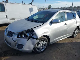 2010 Pontiac Vibe w/1SB with VIN 5Y2SP6E08AZ411868, listed as a IAAI auction lot 41146998 with 154,943 mi miles. Bid and sale history available at carsss.com. Image 2.