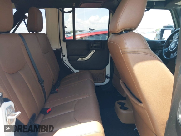 2018 Jeep Wrangler Unlimited Sahara with VIN 1C4BJWEG3JL805263, listed as a IAAI auction lot 42593276 with 96,489 mi miles and . Bid and sale history available at DreamBid. Image 8.
