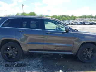2016 Jeep Grand Cherokee Overland with VIN 1C4RJFCG6GC417485, listed as a IAAI auction lot 42210973 with 115,612 mi miles and . Bid and sale history available at DreamBid. Image 13.