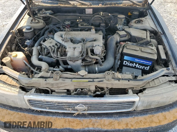 1992 Nissan Maxima с VIN JN1HJ01F1NT007180, выставлен на аукционе Copart как лот 71271334 с пробегом 252 299 миль миль и Чистый • Clean title. История ставок и продаж доступна на DreamBid. Изображение 11.