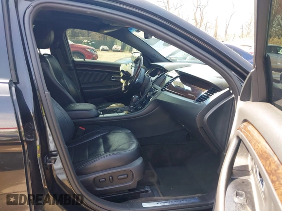 2014 Ford Taurus Limited with VIN 1FAHP2F80EG104984, listed as a IAAI auction lot 41910463 with 174,034 mi miles. Bid and sale history available at carsss.com. Image 5.