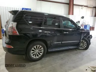 2014 Lexus GX with VIN JTJBM7FX2E5077180, listed as a Copart auction lot 50902595 with 135,115 mi miles and Salvage Title. Bid and sale history available at carsss.com. Image 3.