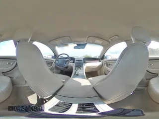 2012 Ford Taurus Limited z VIN 1FAHP2FW0CG126852, wystawiony jako Copart lot #56157325 z przebiegiem 222 514 mil mil oraz Szkoda całkowita • Salvage title. Historia ofert i sprzedaży dostępna na DreamBid. Obrazek 14.