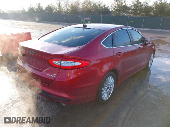 2015 Ford Fusion SE Hybrid with VIN 3FA6P0LUXFR282022, listed as a IAAI auction lot 41652820 with 210,865 mi miles. Bid and sale history available at carsss.com. Image 4.