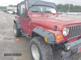 2000 Jeep Wrangler Sport with VIN 1J4FA49S2YP764321, listed as a IAAI auction lot 42385965 with Not provided miles and . Bid and sale history available at DreamBid. Image 1.