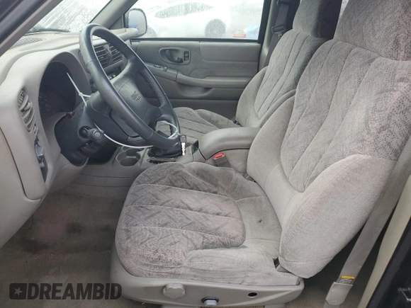 1998 GMC Jimmy SL with VIN 1GKCS13W8W2572514, listed as a Copart auction lot 83016224 with 85,044 mi miles and Salvage Title. Bid and sale history available at carsss.com. Image 7.