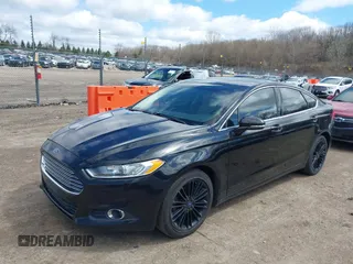 2014 Ford Fusion SE with VIN 3FA6P0HD1ER373400, listed as a IAAI auction lot 42046660 with 191,621 mi miles and . Bid and sale history available at DreamBid. Image 2.