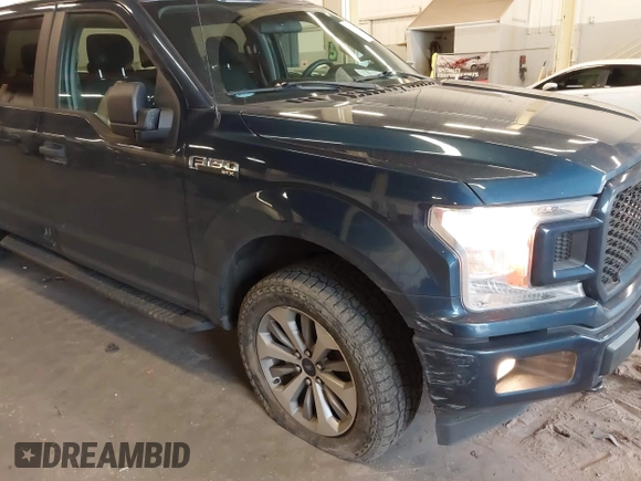 2018 Ford F-150 XL with VIN 1FTEW1EPXJKE93689, listed as a IAAI auction lot 41710693 with 117,065 mi miles. Bid and sale history available at carsss.com. Image 6.