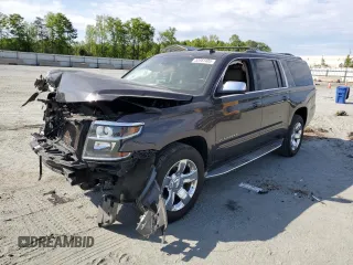 2015 Chevrolet Suburban LTZ with VIN 1GNSCKKC8FR290860, listed as a Copart auction lot 53561485 with 209,077 mi miles and Salvage title. Bid and sale history available at DreamBid. Image 1.