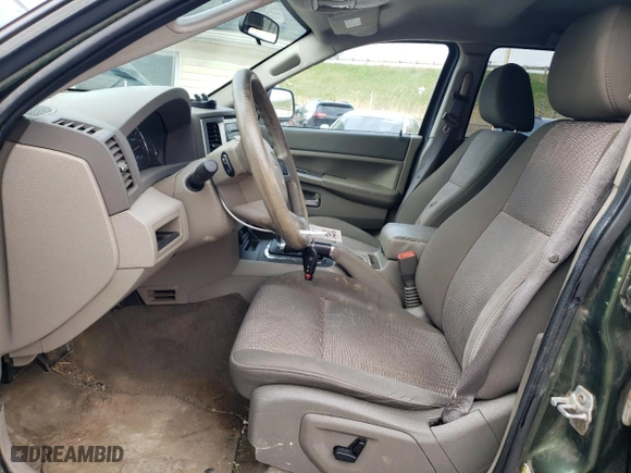 2009 Jeep Grand Cherokee Laredo with VIN 1J8GR48K59C504128, listed as a Copart auction lot 52807835 with 182,053 mi miles and Clean Title. Bid and sale history available at carsss.com. Image 7.