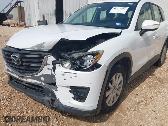 2016 Mazda CX-5 Sport with VIN JM3KE2BYXG0683318, listed as a IAAI auction lot 41777751 with 116,922 mi miles. Bid and sale history available at carsss.com. Image 19.