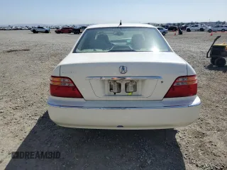 2002 Acura RL z VIN JH4KA96522C011028, wystawiony jako Copart lot #61027505 z przebiegiem 104 094 mil mil oraz Szkoda całkowita • Salvage title. Historia ofert i sprzedaży dostępna na DreamBid. Obrazek 6.
