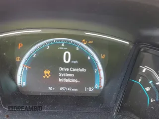 2019 Honda Civic LX with VIN 19XFC2F68KE007409, listed as a IAAI auction lot 41887406 with 57,147 mi miles and . Bid and sale history available at DreamBid. Image 15.