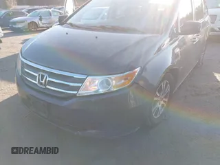 2013 Honda Odyssey EX-L with VIN 5FNRL5H64DB034860, listed as a IAAI auction lot 42013204 with 104,314 mi miles and . Bid and sale history available at carsss.com. Image 6.