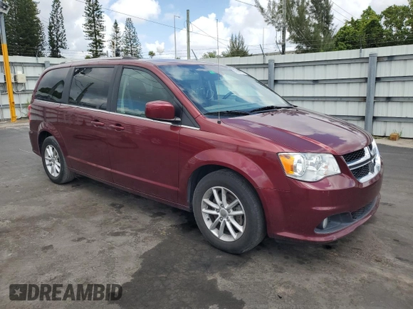 2019 Dodge Grand Caravan SXT with VIN 2C4RDGCGXKR807759, listed as a Copart auction lot 56098575 with 119,268 mi miles and Salvage Title. Bid and sale history available at DreamBid. Image 4.