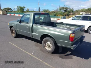 2002 Mazda B-Series 2WD Truck SX with VIN 4F4YR12D32TM21251, listed as a IAAI auction lot 41273974 with 155,165 mi miles. Bid and sale history available at carsss.com. Image 3.