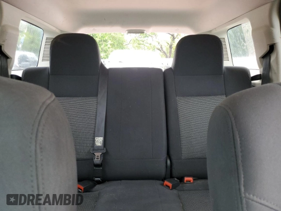 2010 Jeep Patriot Sport z VIN 1J4NF2GB8AD557735, wystawiony jako Copart lot #56532175 z przebiegiem 160 576 mil mil oraz Szkoda całkowita • Salvage title. Historia ofert i sprzedaży dostępna na DreamBid. Obrazek 10.