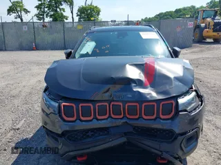 2022 Jeep Compass Trailhawk with VIN 3C4NJDDB9NT160748, listed as a IAAI auction lot 42589269 with 53,092 mi miles and . Bid and sale history available at DreamBid. Image 12.