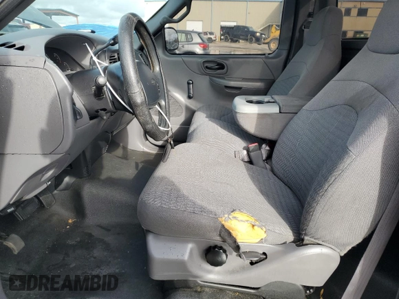 2000 Ford F-150 XL with VIN 1FTZF1725YNB93067, listed as a Copart auction lot 86750464 with Not provided miles and Salvage title. Bid and sale history available at DreamBid. Image 7.