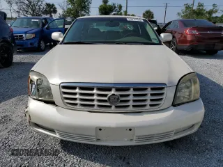 2003 Cadillac DeVille DTS z VIN 1G6KF57933U147843, wystawiony jako Copart lot #55875195 z przebiegiem 160 814 mil mil oraz Szkody całkowita. Historia ofert i sprzedaży dostępna na DreamBid. Obrazek 5.