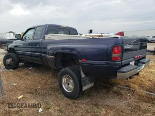 1998 Dodge 3500 with VIN 1B7MF336XWJ189034, listed as a Copart auction lot 68670344 with 117,731 mi miles and Salvage Title. Bid and sale history available at carsss.com. Image 2.