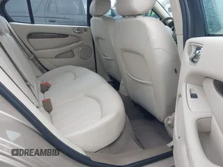 2003 Jaguar X-Type 2.5L Manual z VIN SAJEA51D53XC94089, wystawiony jako IAAI lot #42370566 z przebiegiem 81 687 mil mil oraz . Historia ofert i sprzedaży dostępna na DreamBid. Obrazek 8.
