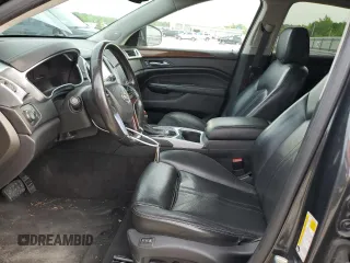 2016 Cadillac SRX Luxury Collection z VIN 3GYFNBE3XGS570448, wystawiony jako Copart lot #54517475 z przebiegiem 119 540 mil mil oraz Szkoda całkowita • Salvage title. Historia ofert i sprzedaży dostępna na DreamBid. Obrazek 7.