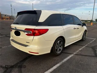 2019 Honda Odyssey Touring z VIN 5FNRL6H86KB053432, wystawiony jako Copart lot #65482425 z przebiegiem 87 470 mil mil oraz Szkoda całkowita • Salvage title. Historia ofert i sprzedaży dostępna na DreamBid. Obrazek 4.