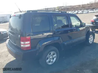 2011 Jeep Liberty Sport 70th Anniversary with VIN 1J4PN2GKXBW539030, listed as a IAAI auction lot 41913633 with 115,605 mi miles. Bid and sale history available at carsss.com. Image 4.