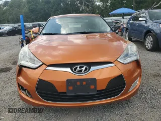2013 Hyundai Veloster w/Red Int with VIN KMHTC6AD5DU094010, listed as a Copart auction lot 58048795 with 90,455 mi miles and Salvage title. Bid and sale history available at DreamBid. Image 5.