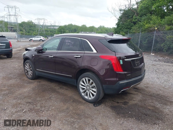 2017 Cadillac XT5 Platinum AWD z VIN 1GYKNFRS2HZ224860, wystawiony jako IAAI lot #42272142 z przebiegiem 95 697 mil mil oraz . Historia ofert i sprzedaży dostępna na DreamBid. Obrazek 3.