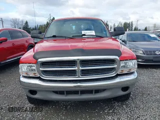 2000 Dodge Dakota Sport with VIN 1B7GG2ANXYS752594, listed as a IAAI auction lot 41671257 with 282,086 mi miles and . Bid and sale history available at carsss.com. Image 13.