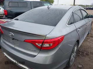 2015 Hyundai Sonata Sport z VIN 5NPE34AB9FH191188, wystawiony jako IAAI lot #42073785 z przebiegiem 92 867 mil mil oraz . Historia ofert i sprzedaży dostępna na DreamBid. Obrazek 4.