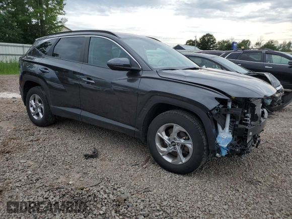 2023 Hyundai Tucson SEL with VIN 5NMJBCAE5PH186784, listed as a Copart auction lot 62896985 with 13,633 mi miles and Salvage title. Bid and sale history available at DreamBid. Image 4.
