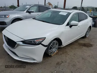 2018 Mazda 6 Grand Touring Reserve with VIN JM1GL1WYXJ1300116, listed as a IAAI auction lot 42088015 with 57,760 mi miles and . Bid and sale history available at DreamBid. Image 17.