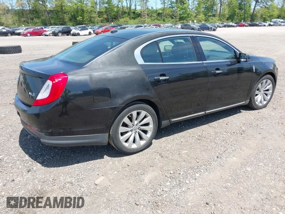 2013 Lincoln MKS with VIN 1LNHL9DKXDG601595, listed as a IAAI auction lot 42239041 with 224,537 mi miles and . Bid and sale history available at DreamBid. Image 4.
