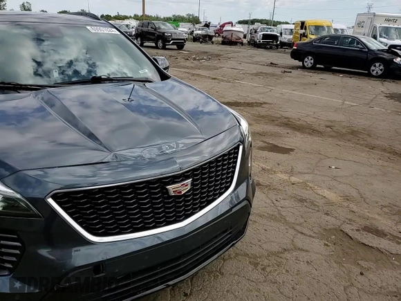 2020 Cadillac XT4 AWD Sport z VIN 1GYFZFR47LF088467, wystawiony jako Copart lot #69901024 z przebiegiem 46 701 mil mil oraz Szkoda całkowita • Salvage title. Historia ofert i sprzedaży dostępna na DreamBid. Obrazek 11.